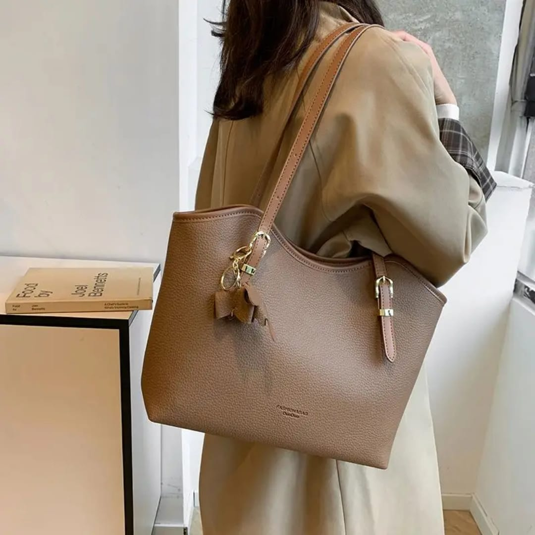 Nikki tote handbag, available in color brown, black, beige and cream. Stylish and elegant bag