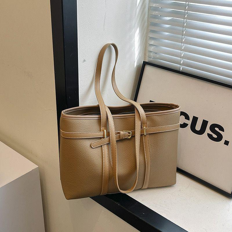 TZ  fashionable  bags. Available in black, brown, cream and beige. Classy simple and elegant with multiple compartments