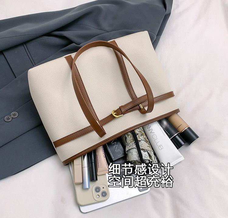 TZ  fashionable  bags. Available in black, brown, cream and beige. Classy simple and elegant with multiple compartments