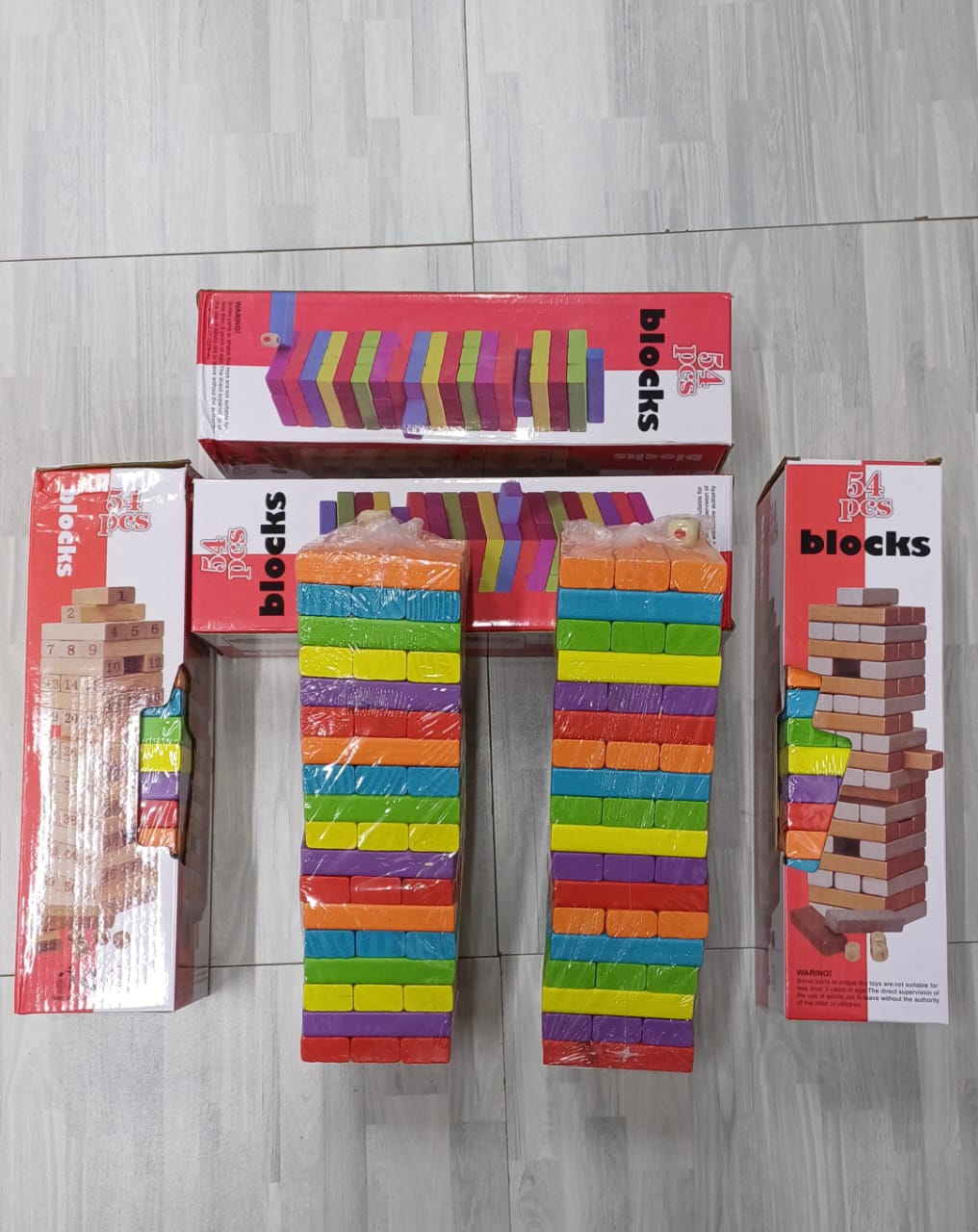 Coloured Jenga Blocks – Stack, Balance & Play. Multi-Way Play – Build towers, match colours, or create your own fun challenges!