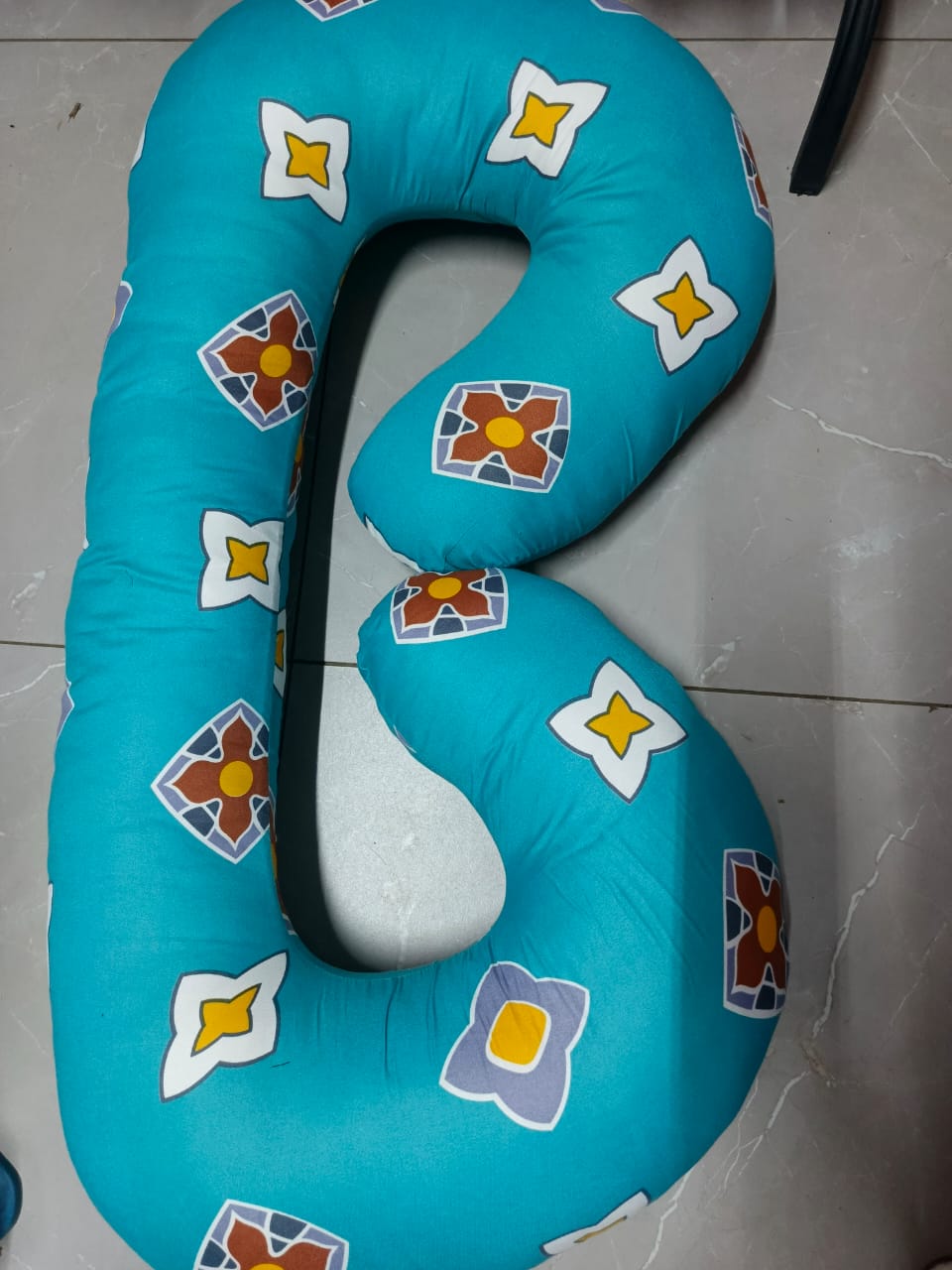 C shape pregnancy pillow helps support the bump and back for comfort when sleeping