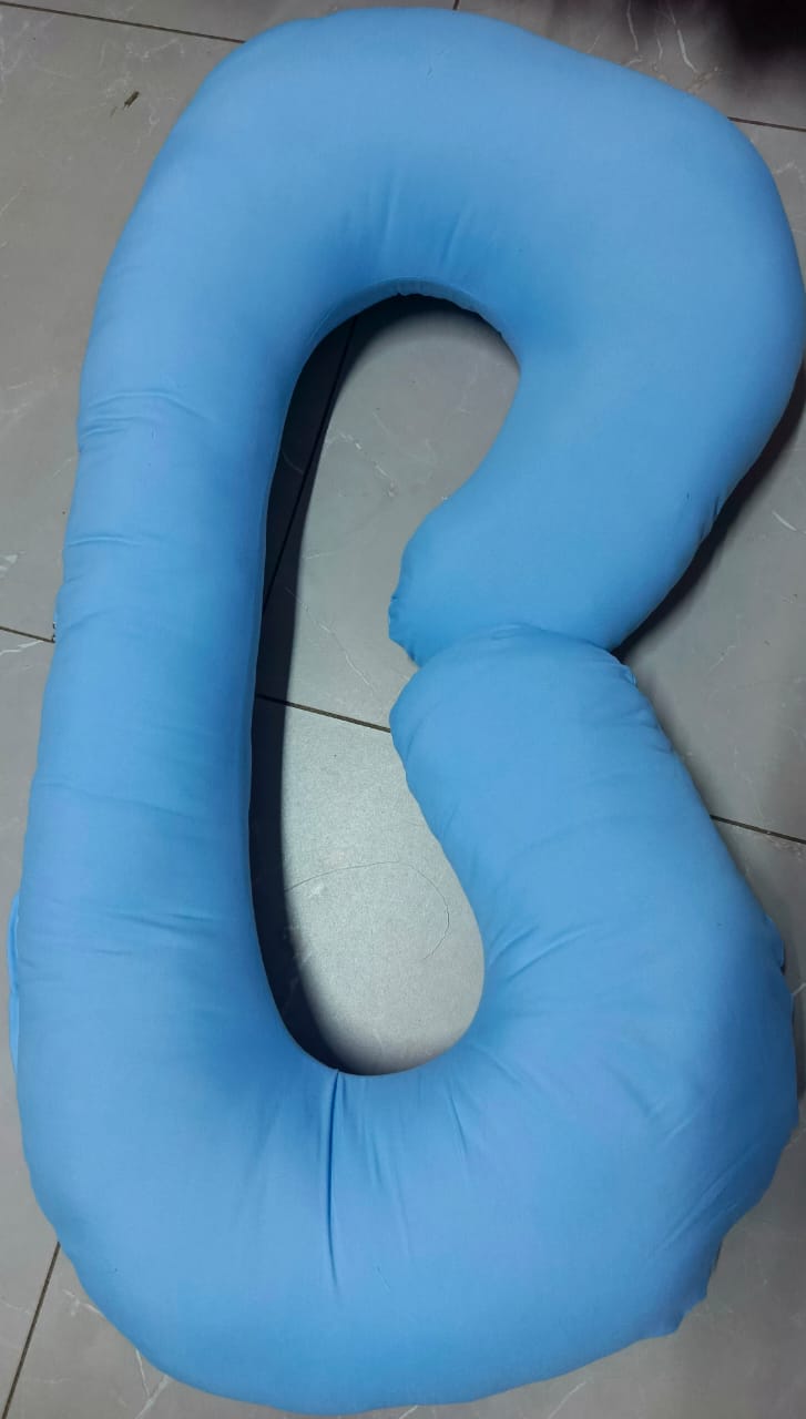 C shape pregnancy pillow helps support the bump and back for comfort when sleeping