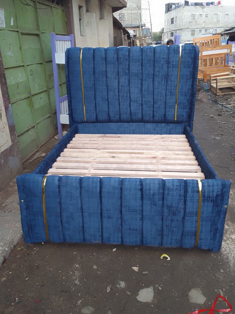 (OFFER!!!) Modern Upholstered Bed Frame – Deep Blue Velvet with Vertical Panel Design & Golden Accent Straps  (Without mattress) 4*6ft, 5*6ft & 6*6ft