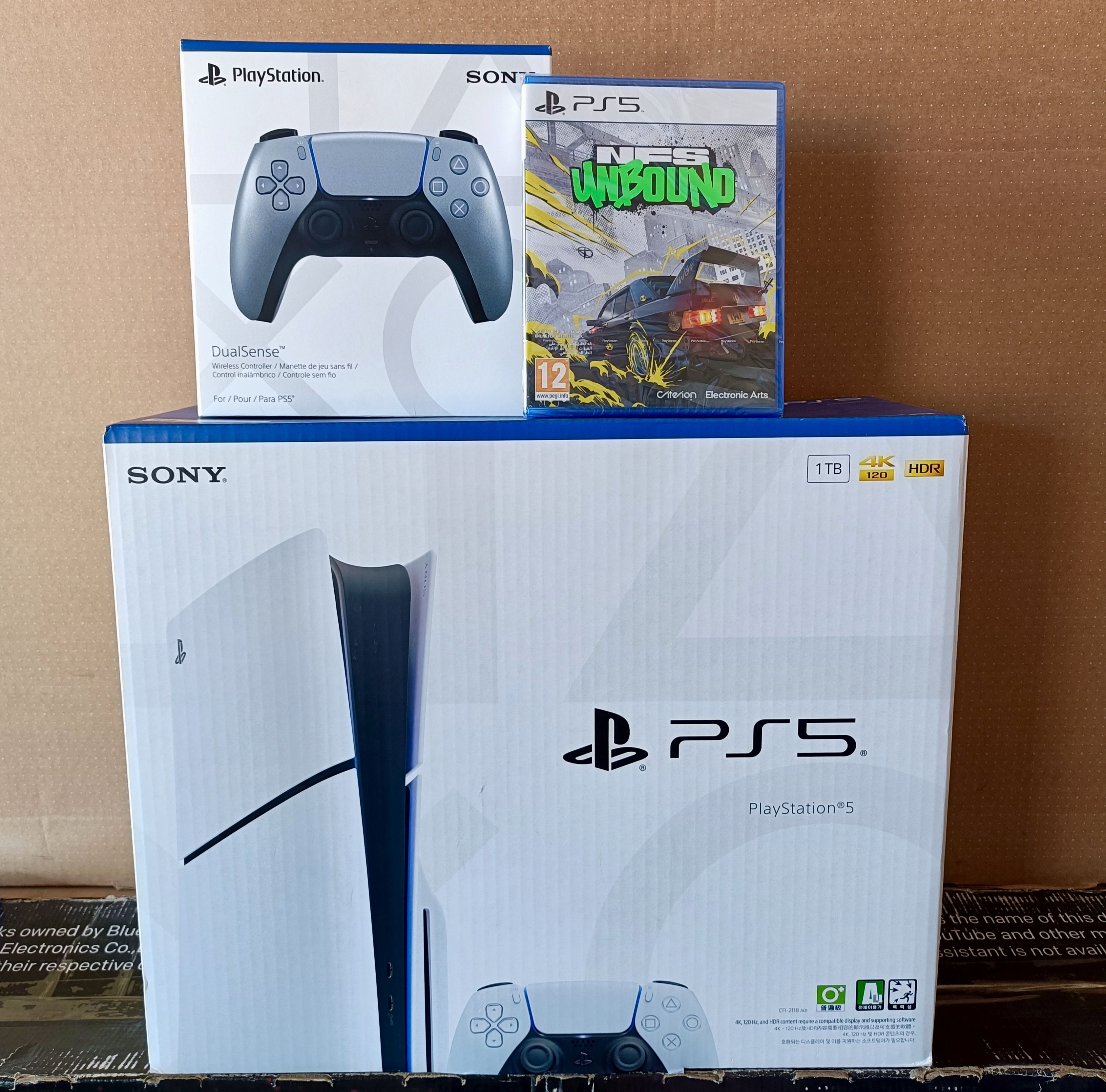 Sony PlayStation 5 (PS5) Slim 1TB Disc Console with Extra Controller and NFS Unbound Game – PS5 Slim