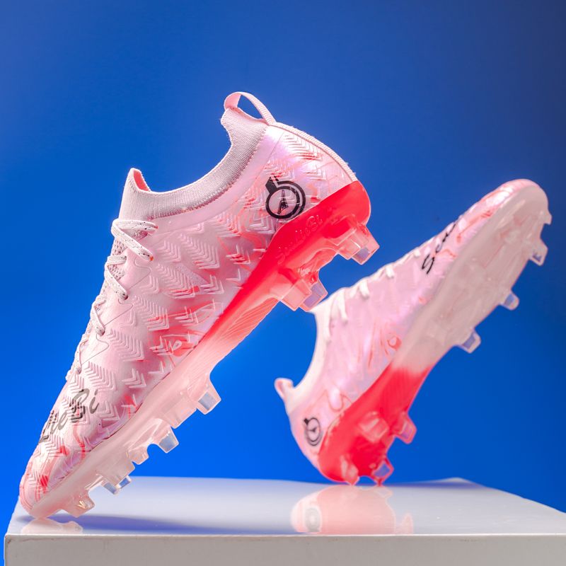 Football shoes with high-elastic anti-slip rubber outsole, resistant to deformation during high-intensity confrontations, providing stable support and preventing ankle sprains