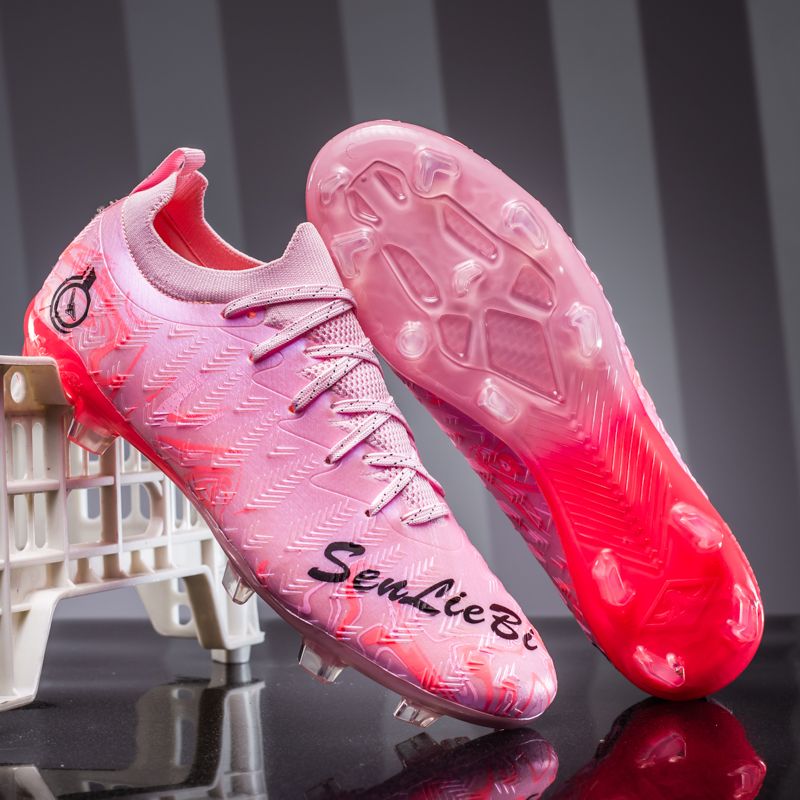 Football shoes with high-elastic anti-slip rubber outsole, resistant to deformation during high-intensity confrontations, providing stable support and preventing ankle sprains