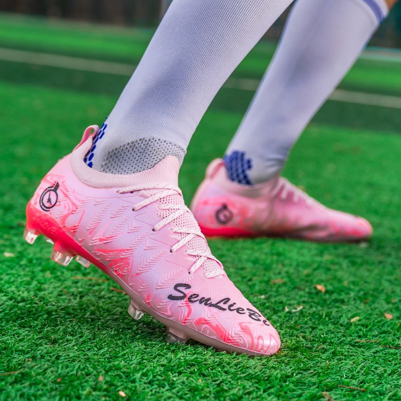 Football shoes with high-elastic anti-slip rubber outsole, resistant to deformation during high-intensity confrontations, providing stable support and preventing ankle sprains