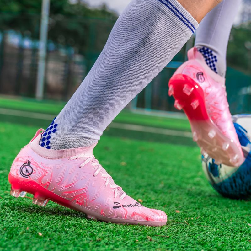 Football shoes with high-elastic anti-slip rubber outsole, resistant to deformation during high-intensity confrontations, providing stable support and preventing ankle sprains