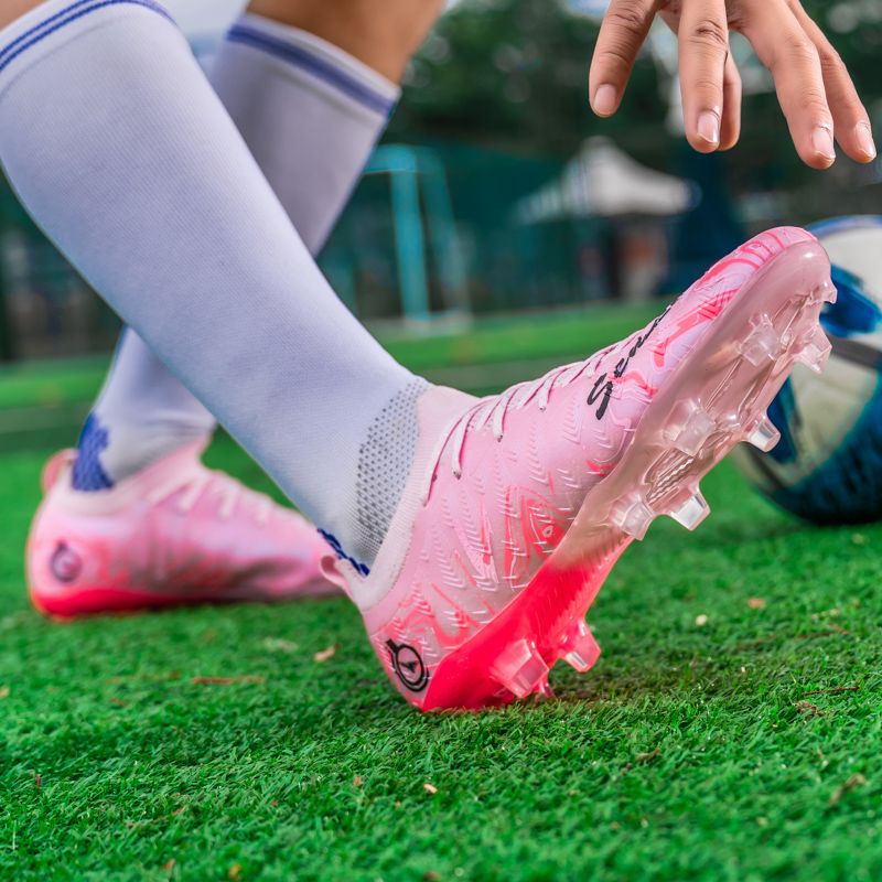 Football shoes with high-elastic anti-slip rubber outsole, resistant to deformation during high-intensity confrontations, providing stable support and preventing ankle sprains