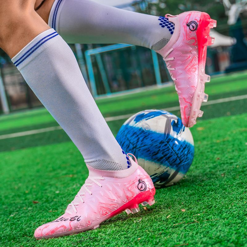 Football shoes with high-elastic anti-slip rubber outsole, resistant to deformation during high-intensity confrontations, providing stable support and preventing ankle sprains