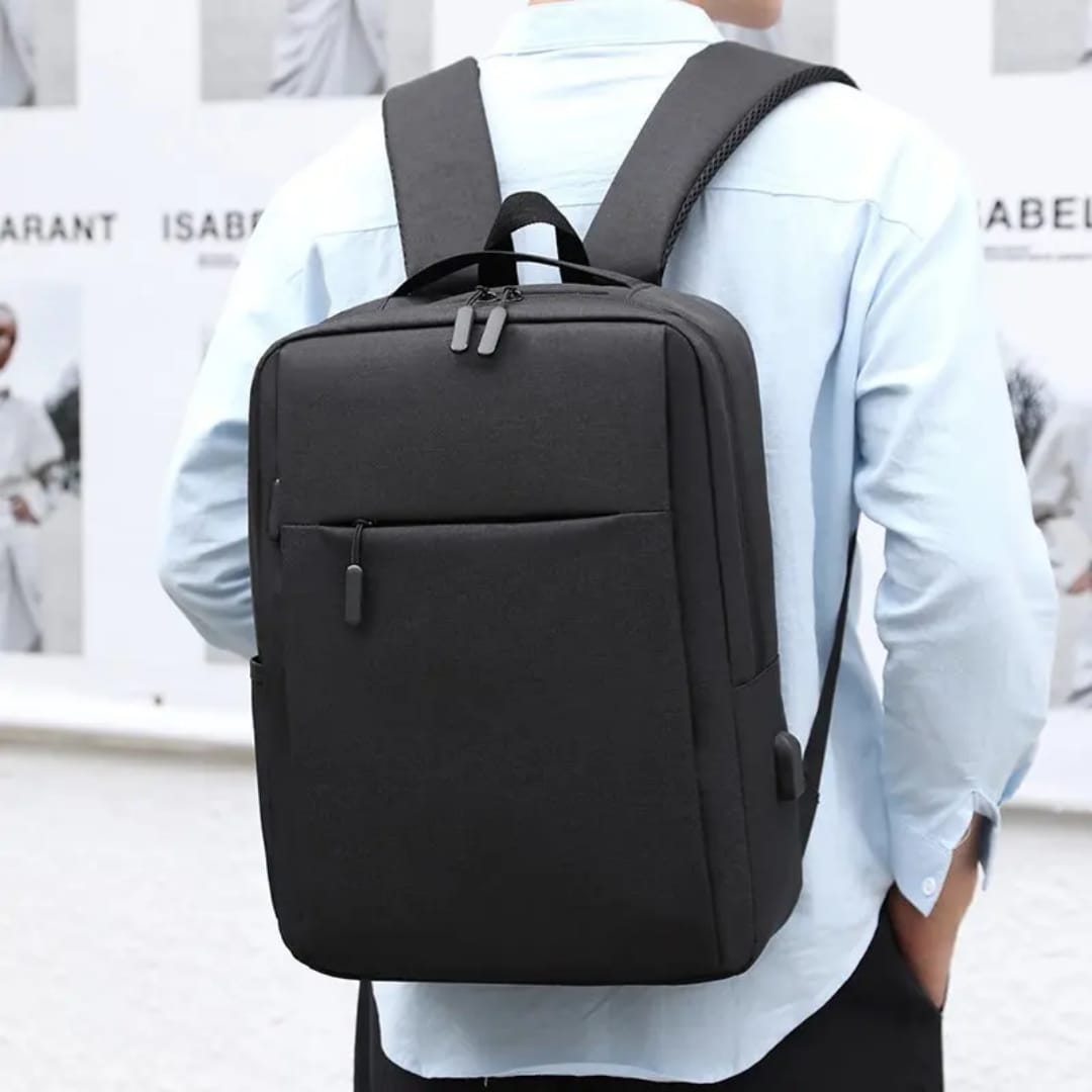 Travel Laptop Backpack.
Features: This backpack is designed to be water-resistant and includes an anti-theft design. It has a built-in USB charging port and a charging cable, allowing you to charge de