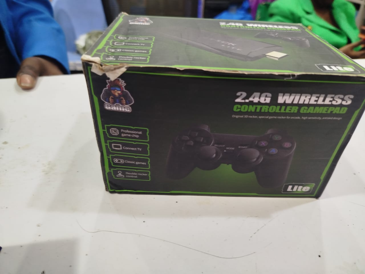 2.4G wireless controller and gamepad kit. It is a portable TV video game console designed for retro gaming. 
Key features of the Game Stick Lite include:
Wireless Connectivity: It uses 2.4G wireless c