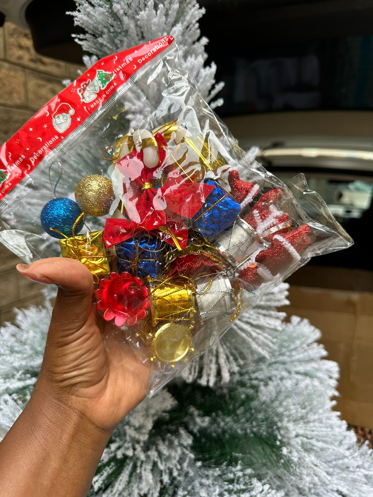 mixed Christmas tree ornaments. 
The pack contains assorted shiny balls, drums, and other decorative shapes in multiple colors. 
They are described as being lightweight, durable, and shatterproof, mak