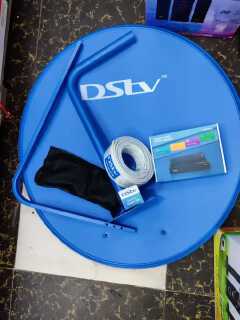 DStv full kit, which includes a satellite dish, a decoder, and installation accessories like an LNB and coaxial cable. 
This kit includes all the necessary accessories for installation, though the ins