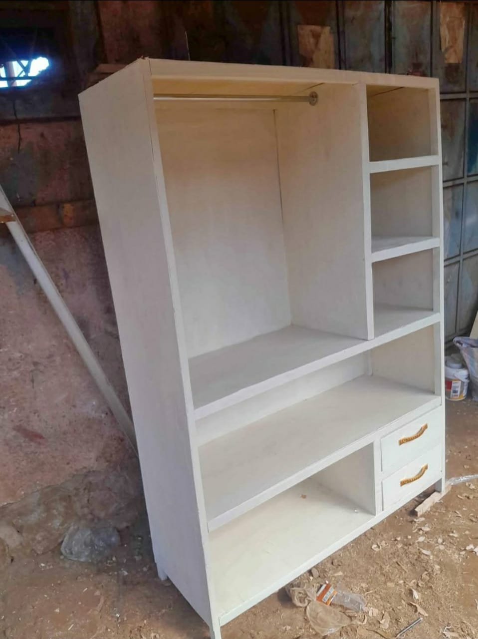 Wooden wardrobe with shelving and drawers