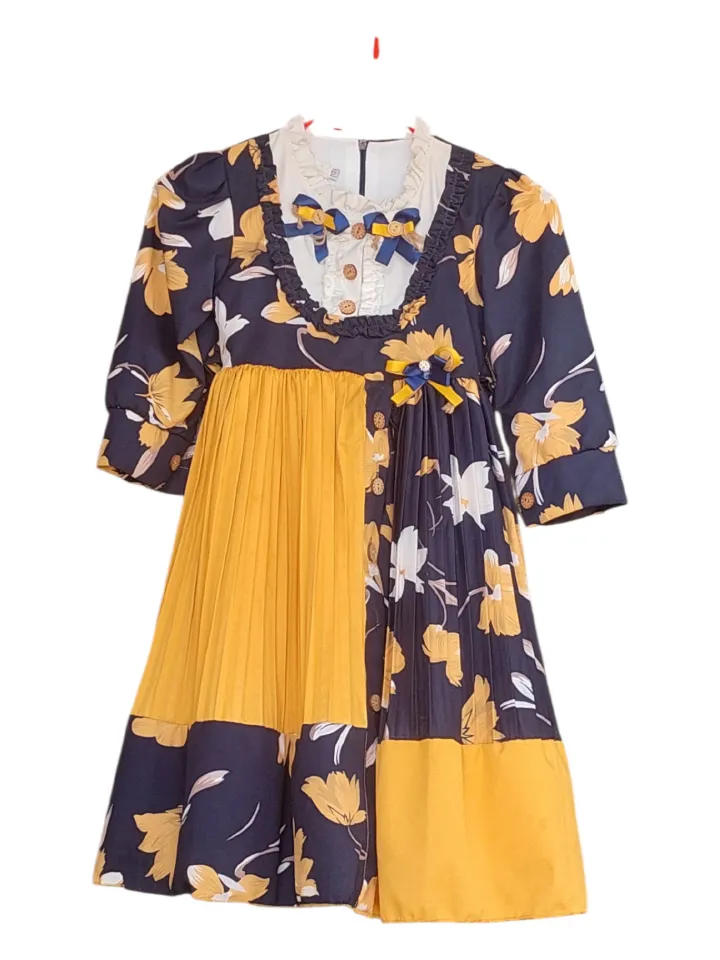 A charming beautiful girls dress fit & flare style with pleated skirt.