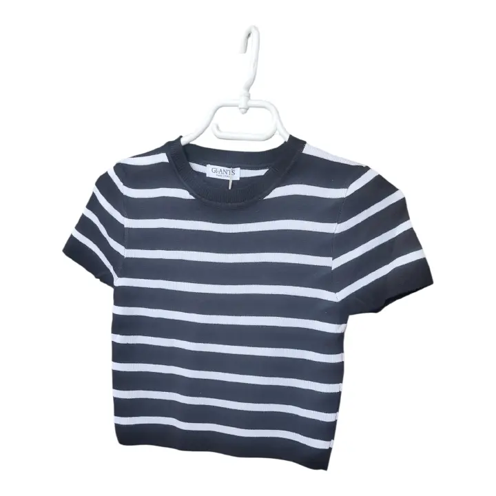 Unleash your inner Barbie with this glamorous & chic black& white striped crop top.