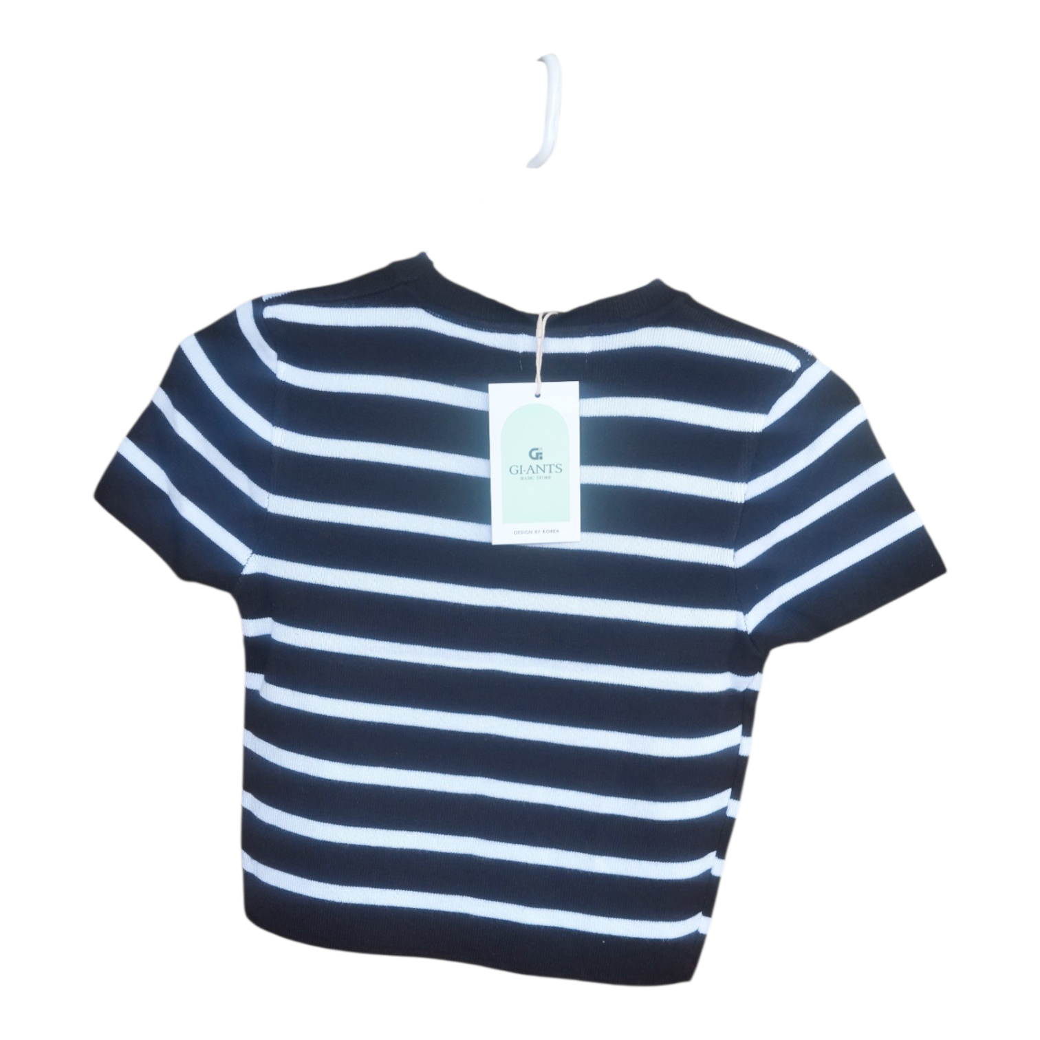 Unleash your inner Barbie with this glamorous and chic black and white striped crop top.