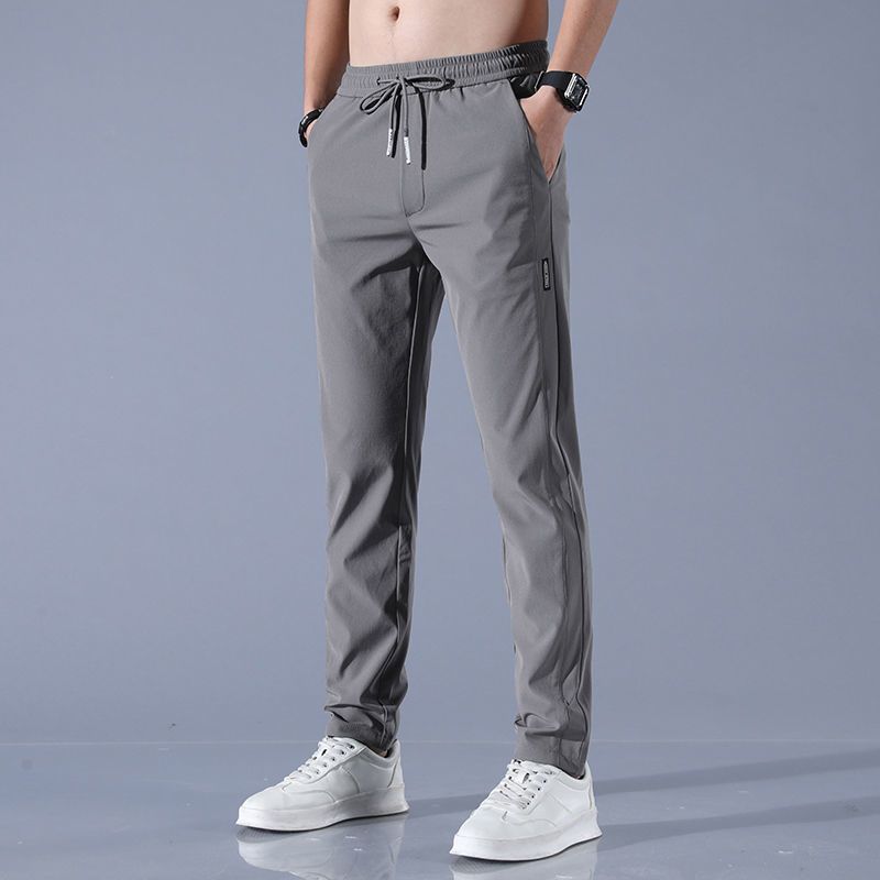 Solid-color classic and simple versatile business casual trousers for men. Trendy, loose, comfortable, breathable, ice-silk breathable straight-leg pants