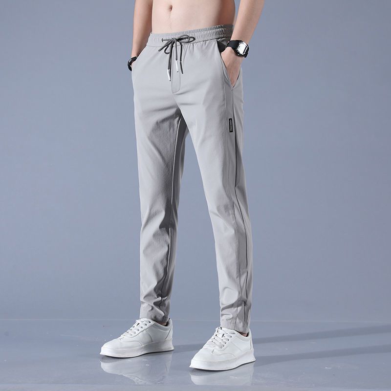 Solid-color classic and simple versatile business casual trousers for men. Trendy, loose, comfortable, breathable, ice-silk breathable straight-leg pants