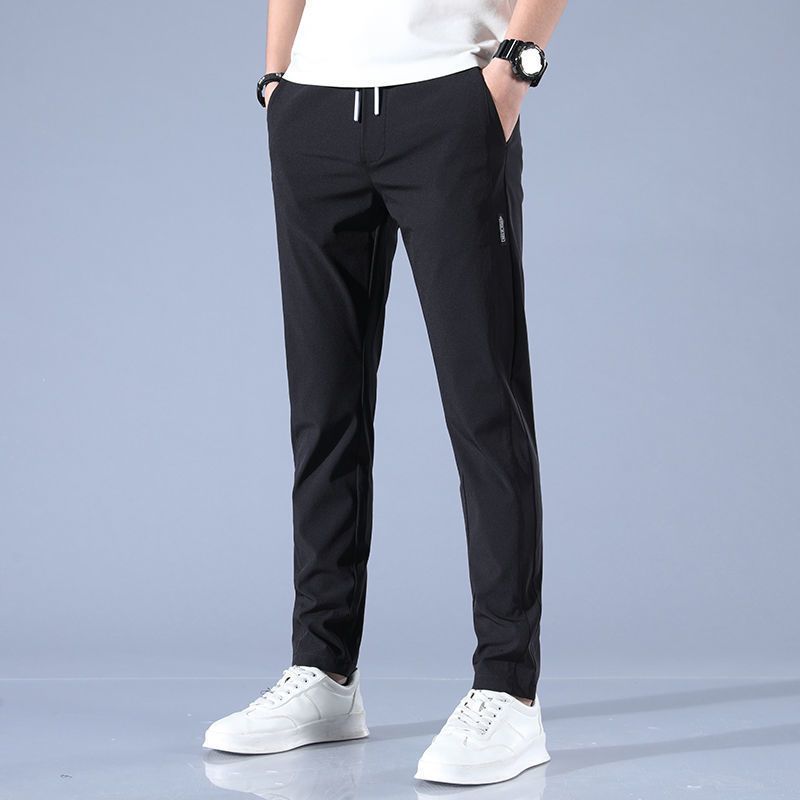 Solid-color classic and simple versatile business casual trousers for men. Trendy, loose, comfortable, breathable, ice-silk breathable straight-leg pants