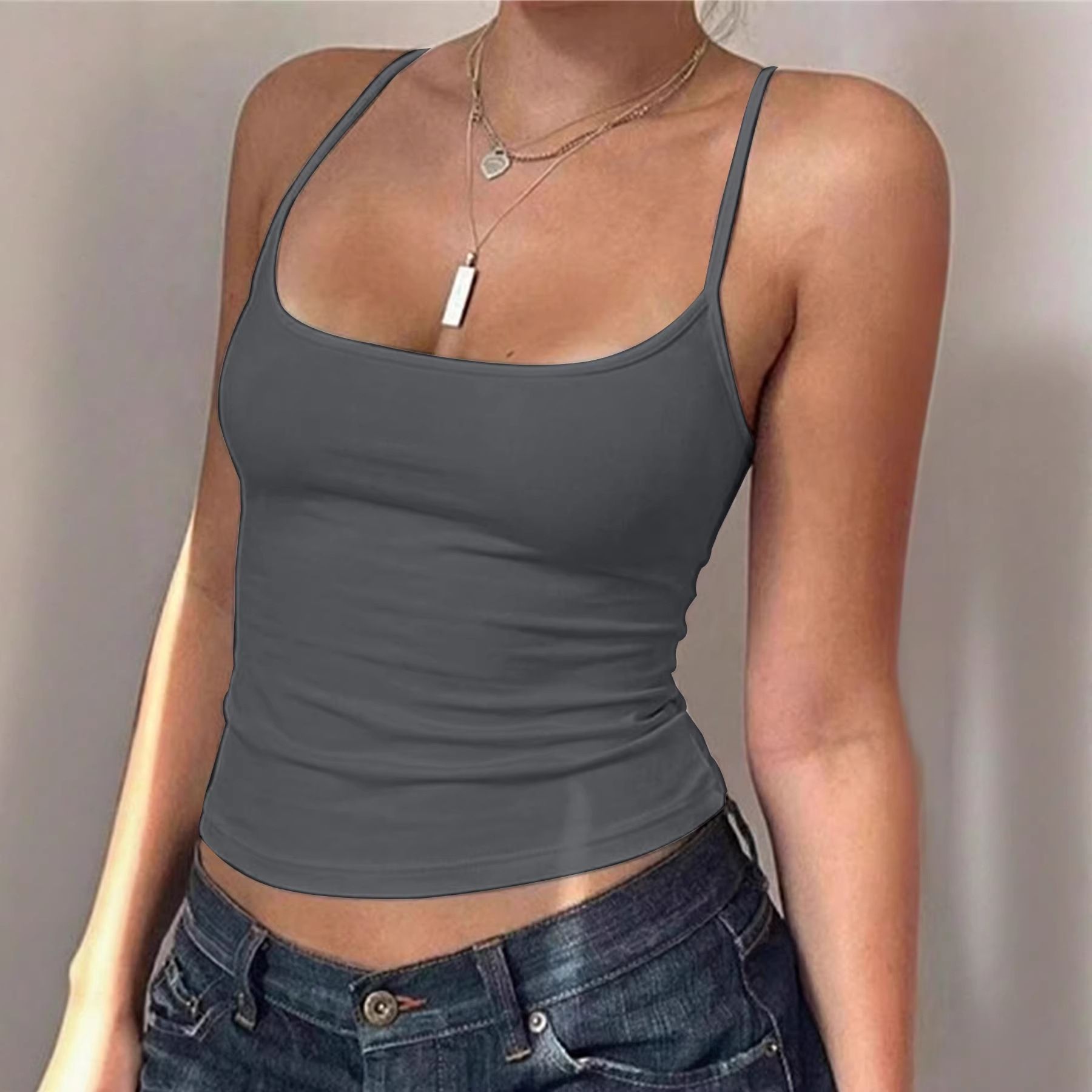 European style solid-color "hot girl" single-shoulder V-neck inner top with a small bra. For summer, it is a one-piece outfit that can be worn as outerwear and also features a fitted suspender style