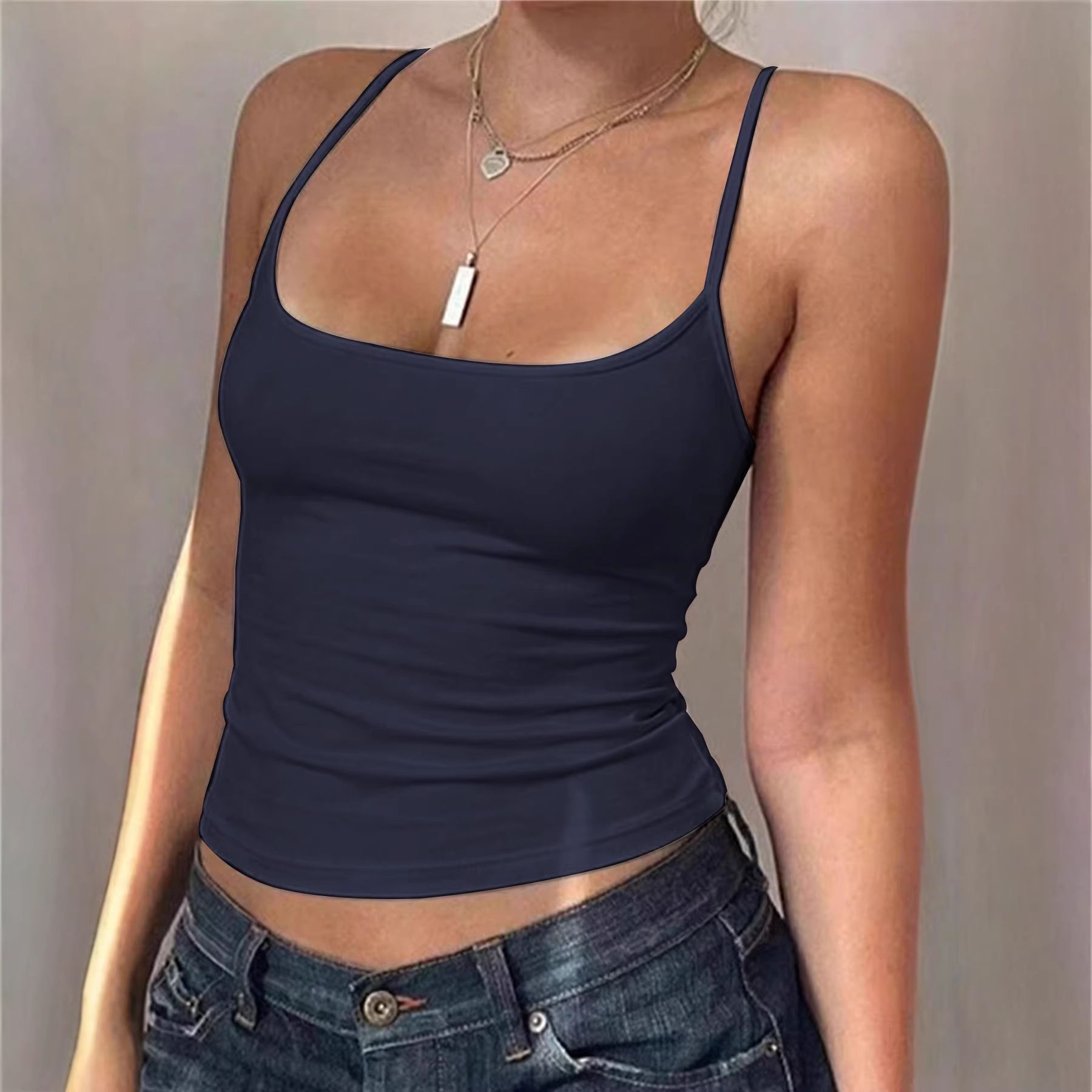 European style solid-color "hot girl" single-shoulder V-neck inner top with a small bra. For summer, it is a one-piece outfit that can be worn as outerwear and also features a fitted suspender style