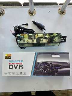 Vehicle Blackbox DVR (Digital Video Recorder), commonly known as a dash camera, which is designed to be installed as a rearview mirror replacement or attachment. It comes with a secondary rear camera