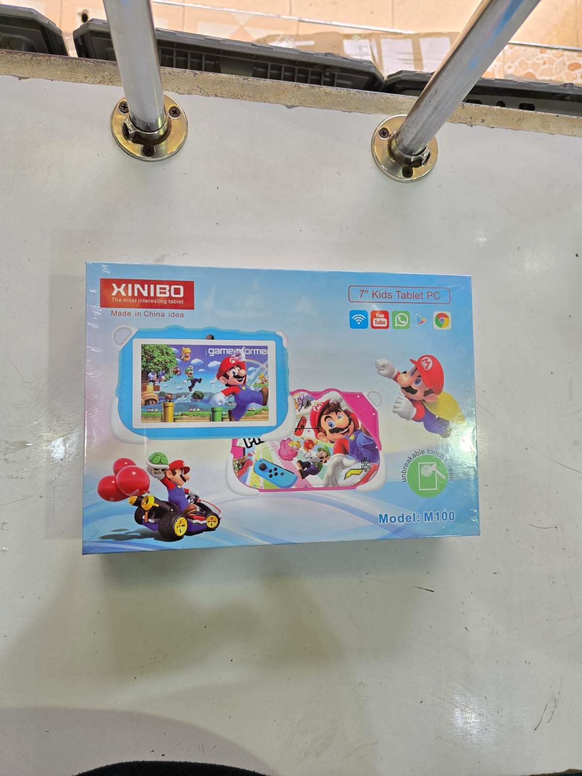 Xinibo 7" Kids Tablet PC, Model: M100. This is a durable educational tablet designed for children, featuring parental controls and preloaded learning apps. 
Display: 7 inches touchscreen. 
Features: W