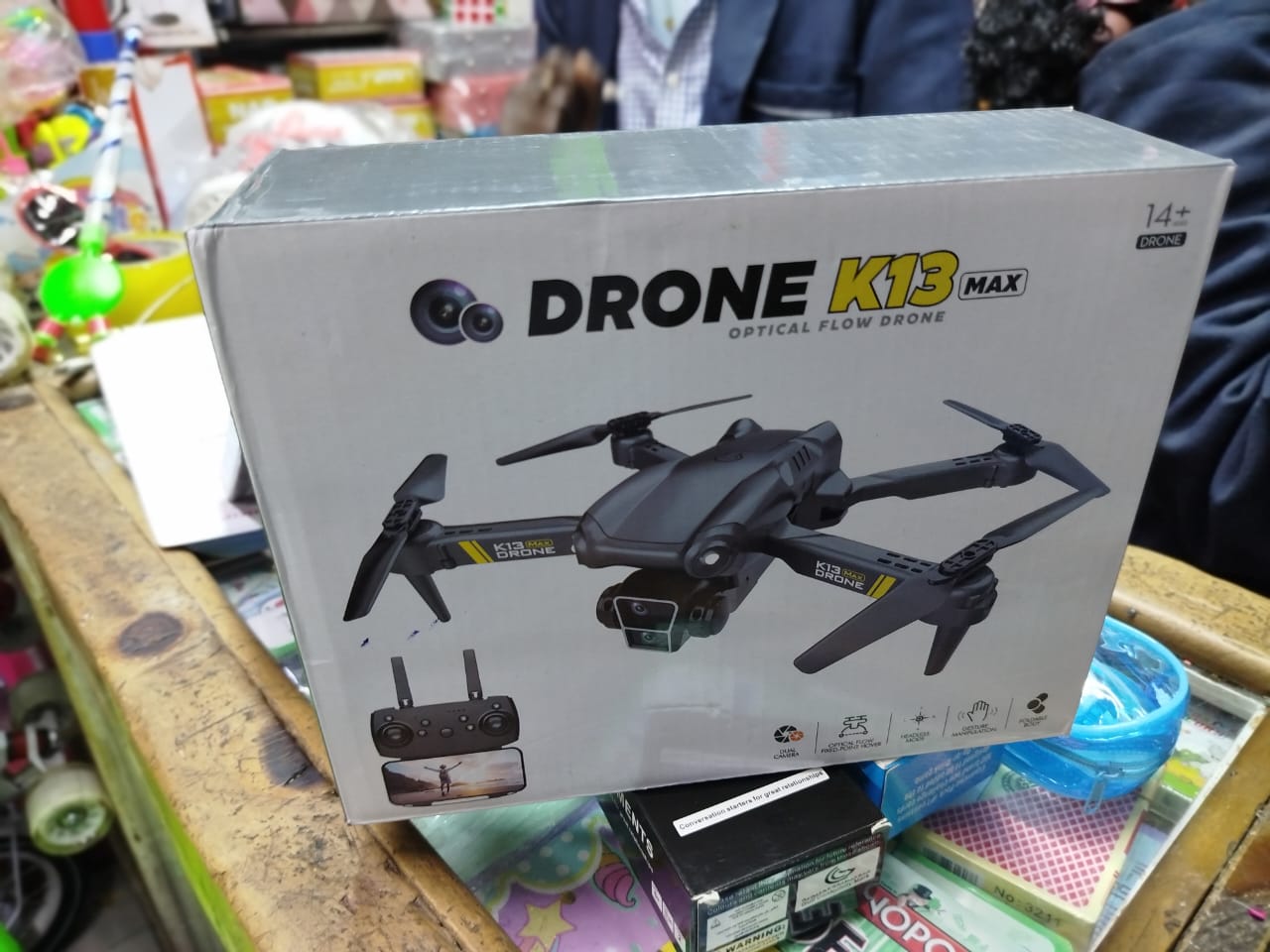 K13 Max drone. This is a foldable, entry-level drone designed for beginners and hobbyists. 
It features an optical flow positioning system for stable flight. 
The drone often includes a high-definitio