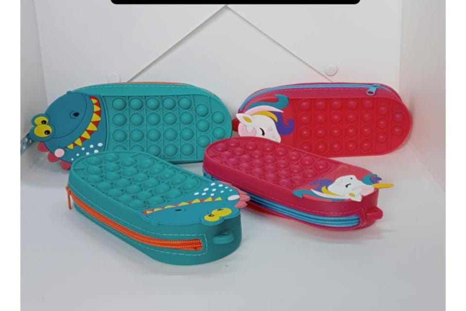 pop-it fidget pencil case. 
Made from durable silicone material.
Features a zipper closure to keep items secure.
Functions as both a stationery pouch and a stress-relief fidget toy.
Lightweight and ea