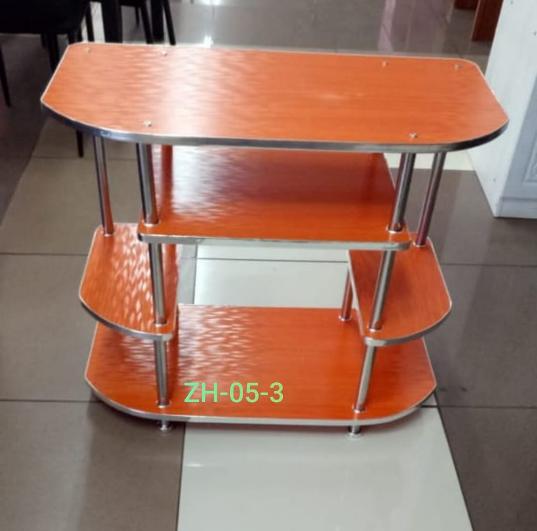 3-tier wood and metal TV stand. It can also be used as a coffee table. 
Design: It features a modern industrial look with three open tiers for storage and a strong metal frame for durability. 
Materia