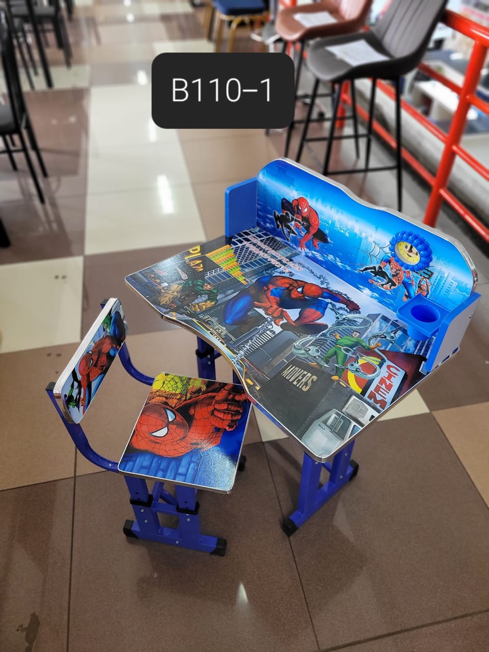 Executive Adjustable Kids Study Table Desk set. 
Features vibrant Spider-Man graphics on the desk surface, backboard, and chair. 
The desk and chair are height-adjustable to accommodate growing childr