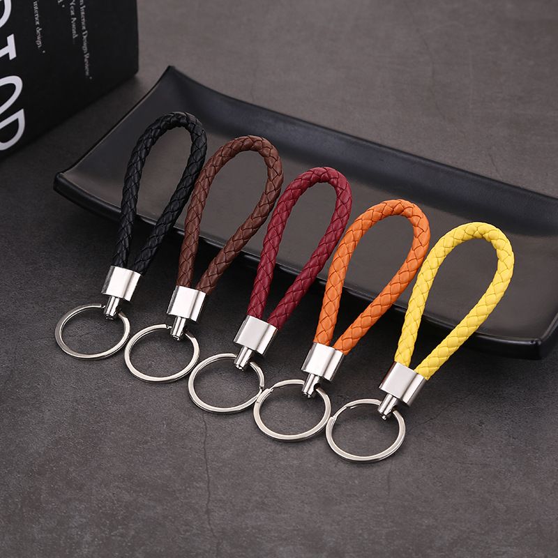 Creative new style leather rope keychain, woven car pendant, colorful key rope pendant, activity small gift accessory(color random)