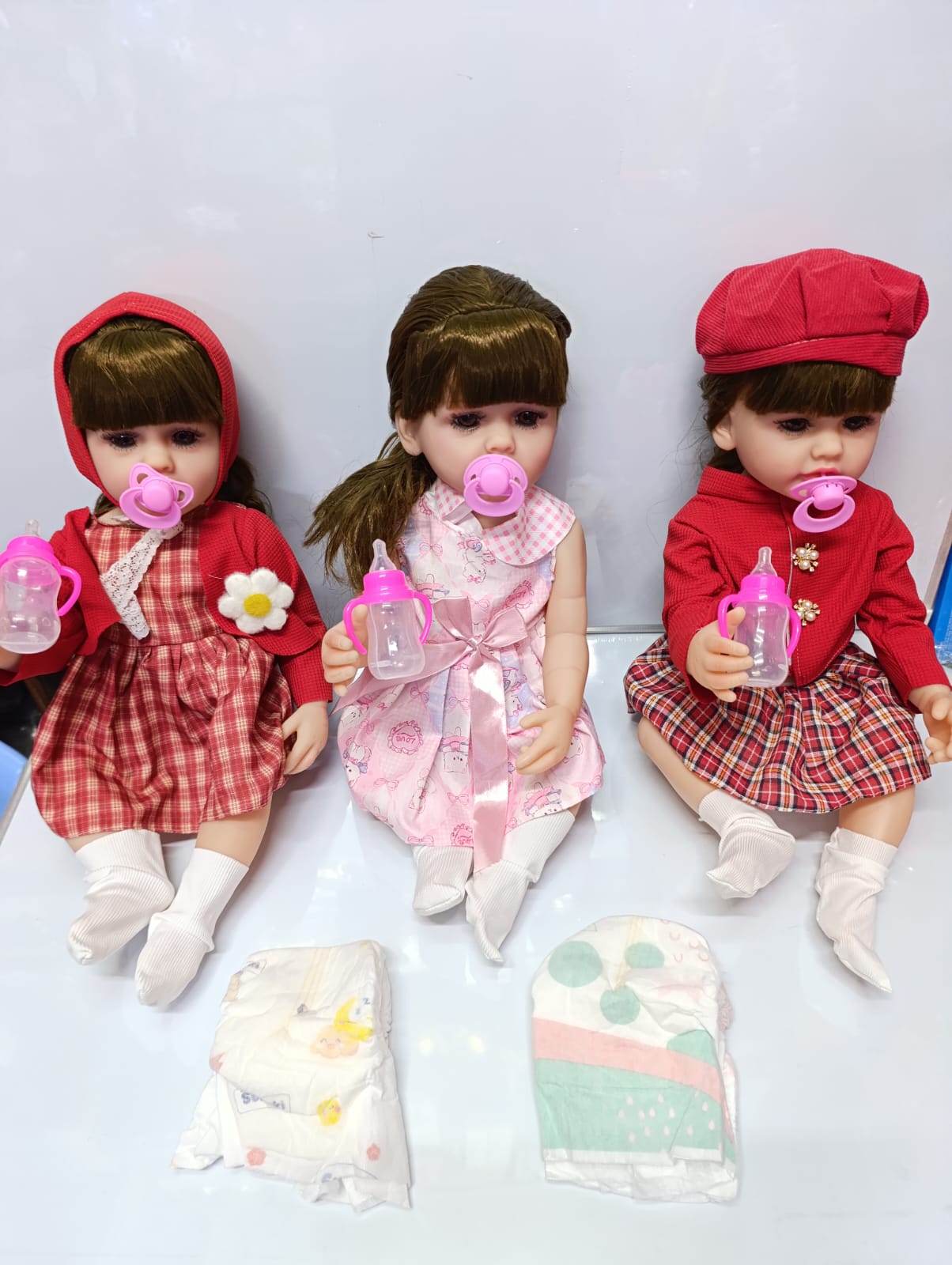 👶 Cute Baby Dolls with Diapers 🧸💕Make playtime extra fun with these adorable baby dolls! Perfect for kids who love caring and role-playing with their own baby doll✨✔ Soft and cute baby dolls