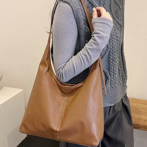 Large-Capacity Retro Minimalist Tote Bag - Perfect For Women's Daily Outings And Commuting Versatile Single-Shoulder Bag In Solid Color Pure Leather The Best Quality Available Online.
