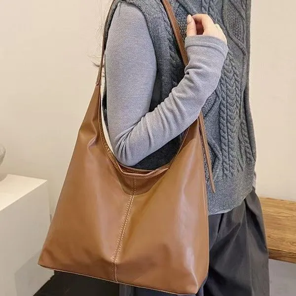 Large-Capacity Retro Minimalist Tote Bag - Perfect For Women's Daily Outings And Commuting Versatile Single-Shoulder Bag In Solid Color Pure Leather The Best Quality Available Online.