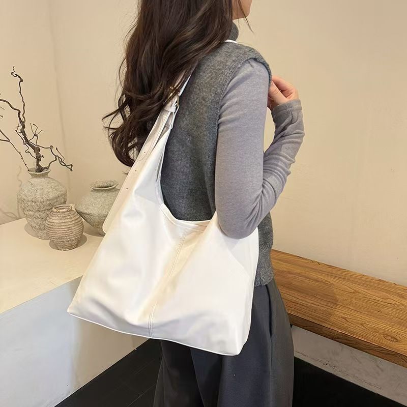 Large-Capacity Retro Minimalist Tote Bag - Perfect For Women's Daily Outings And Commuting Versatile Single-Shoulder Bag In Solid Color Pure Leather The Best Quality Available Online.