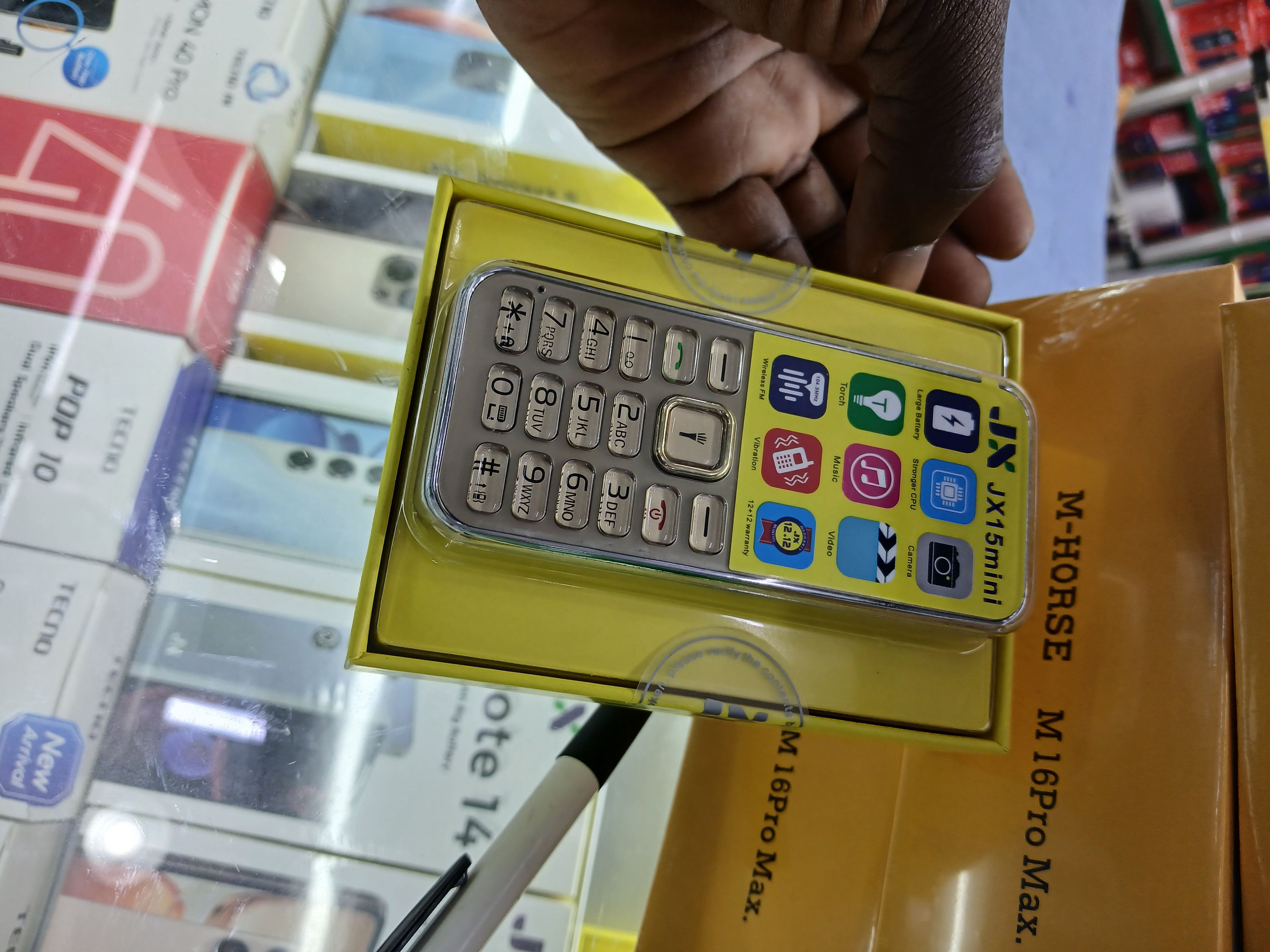(ON OFFER) JX 15MINI WIRELESS FM,TORCH,CAMERA, KABAMBE/KATULULU/MULIKA MWIZI/FEATURE PHONE ONE YEAR WARRANTY VIBRATION DUAL-TWO SIM CARD SCREEN DISPLAY 1.44, 1500mAH STRONG BATTERY JX 15 MINI PHONE