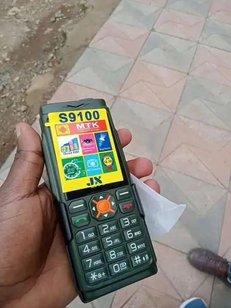 BRAND NEW JX S9100 QUAD SIM POWER BANK PHONE 1.77 inch Display 7200mAh Buletooth Vibrator/Wireless FM/ MP3/MP4/Big Torch/ Auto callrecording/Power Bank Cell Feature Phone