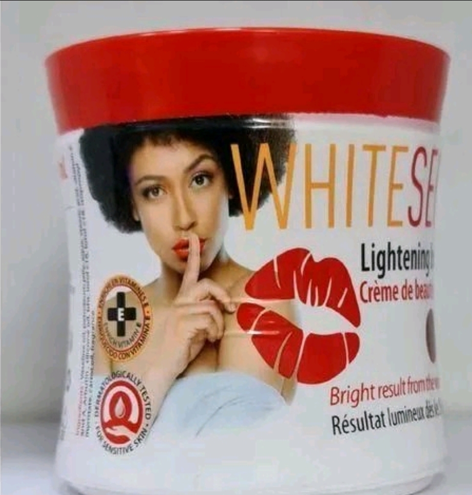 White Secret Cream Lightening & Brightening Body Cream formulated to reduce dark spots blemishes and acne scars while leaving the skin smooth.