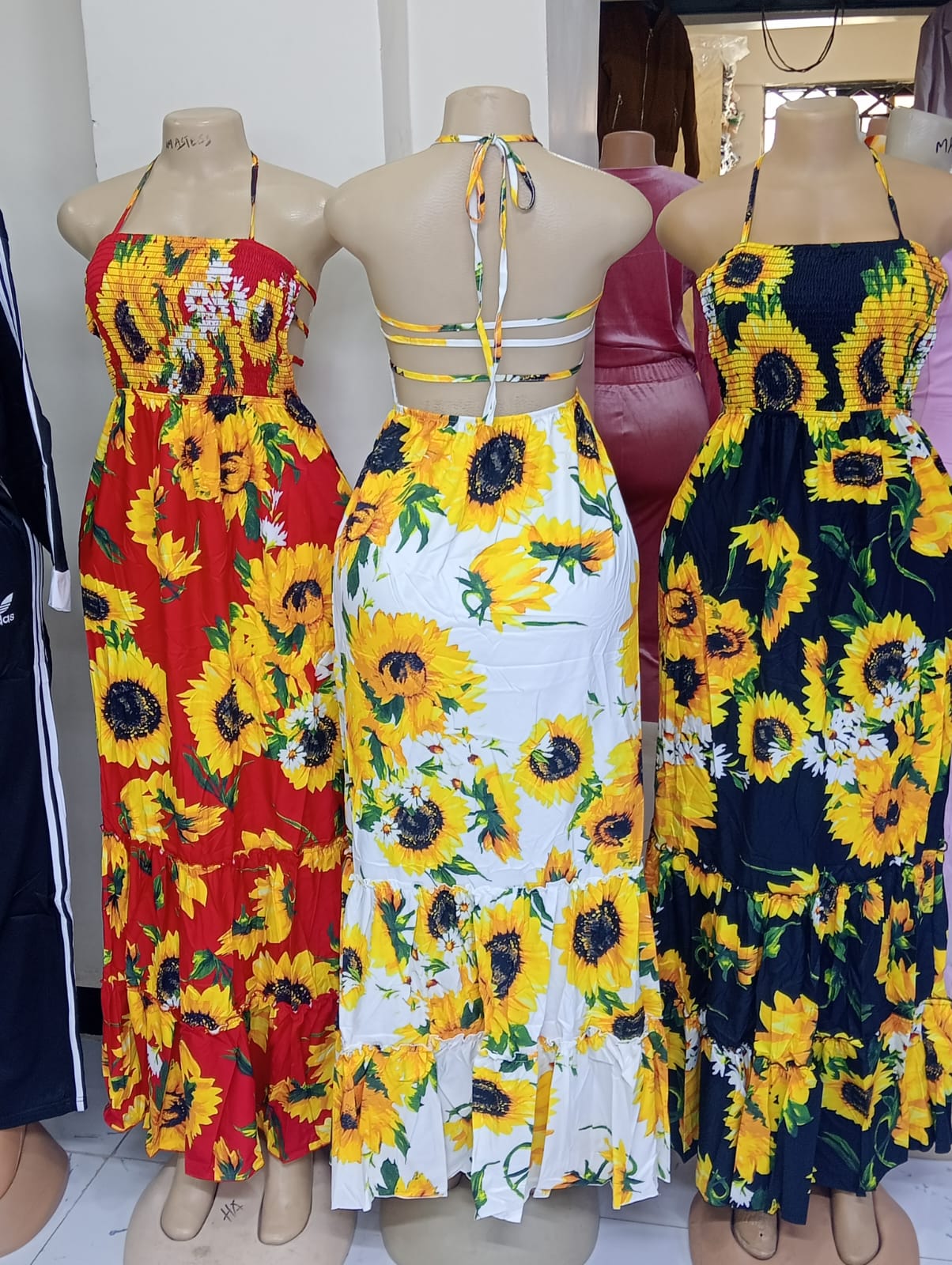 SUMMER, BOLD SUNFLOWER-PRINT, BAREBACK MAXI-DRESS_SUMMER READY HALTER GOWN WITH TIERED SKIRT