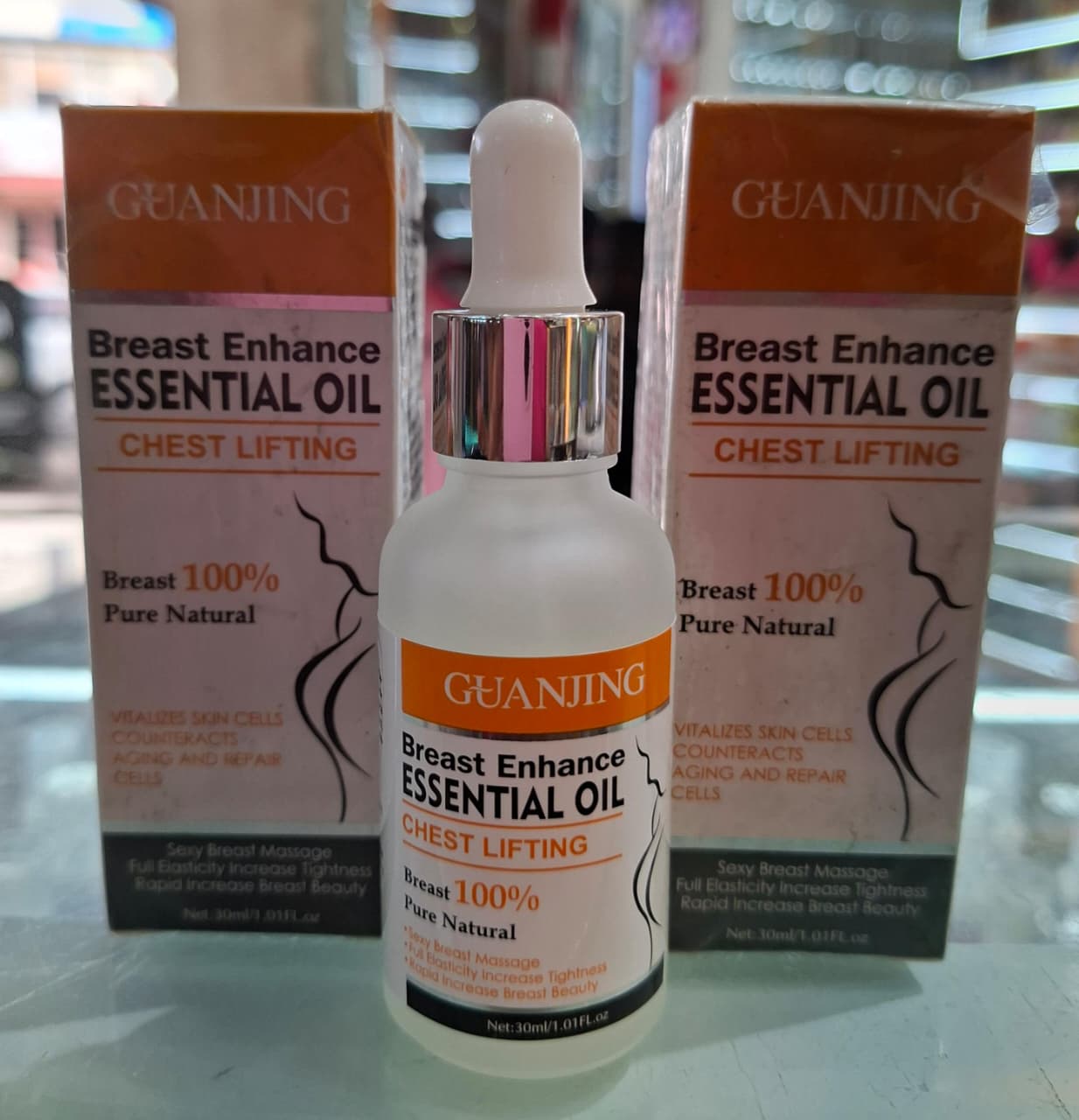 GUANJING Chest lifting essential oil ,tightens and increases breast beauty
