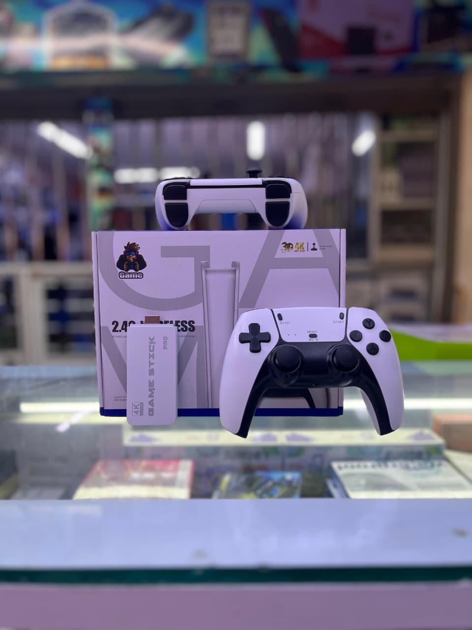 M15 Plus 4K Game Stick. It is a retro gaming console that connects to a TV via an HDMI port and comes with two wireless controllers. The console is pre-loaded with a large number of classic games