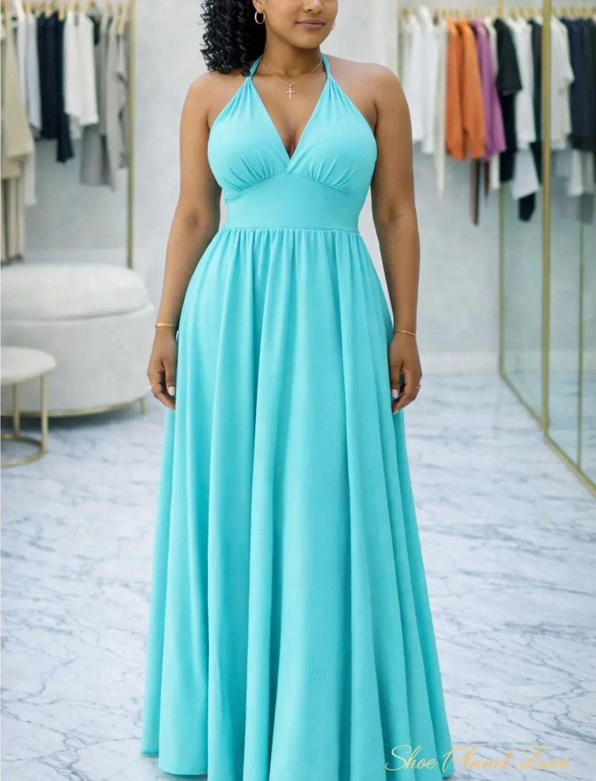 Backless halter maxi evening gown.