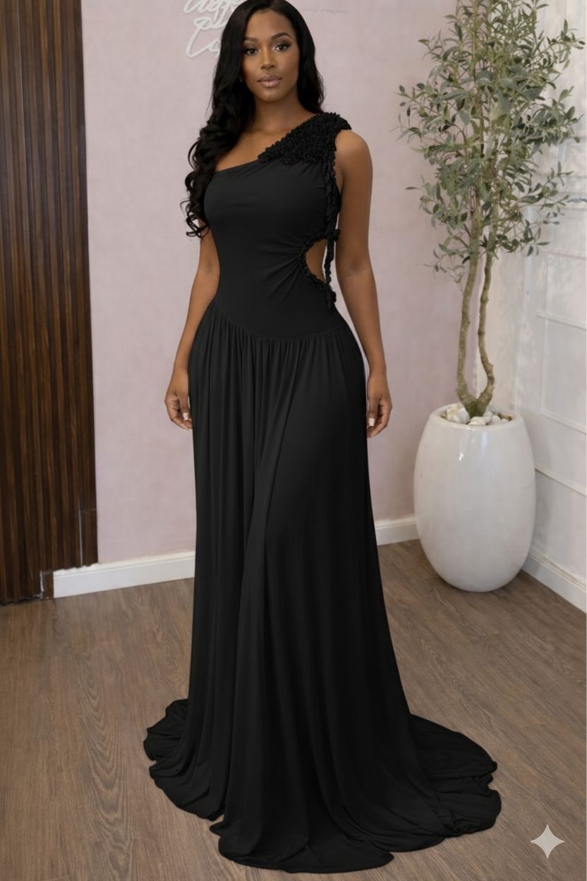 One-shoulder white evening gown.