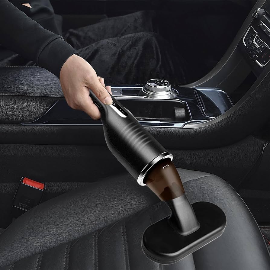 High-pressure 9000Pa Gi-828 car vacuum cleaner with 3 nozzle options. Perfect for dust, dirt, and mite removal in cars and small spaces.