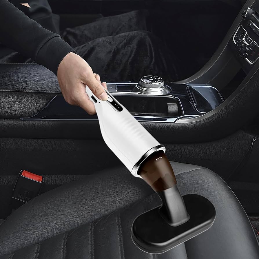 High-pressure 9000Pa Gi-828 car vacuum cleaner with 3 nozzle options. Perfect for dust, dirt, and mite removal in cars and small spaces.