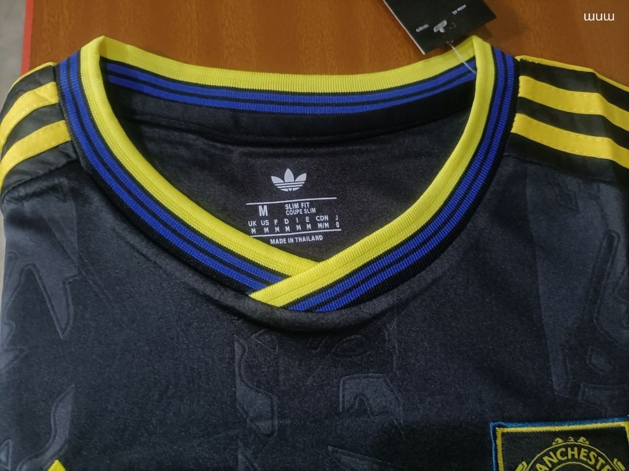 🔥🔥 MAN U JERSEY (BLACK) .Forget the basic reds—we’re going DARK MODE. This Snapdragon x Adidas Trefoil combo is high-key the cleanest drop of the season. It’s giving elite, ICONIC vibes.