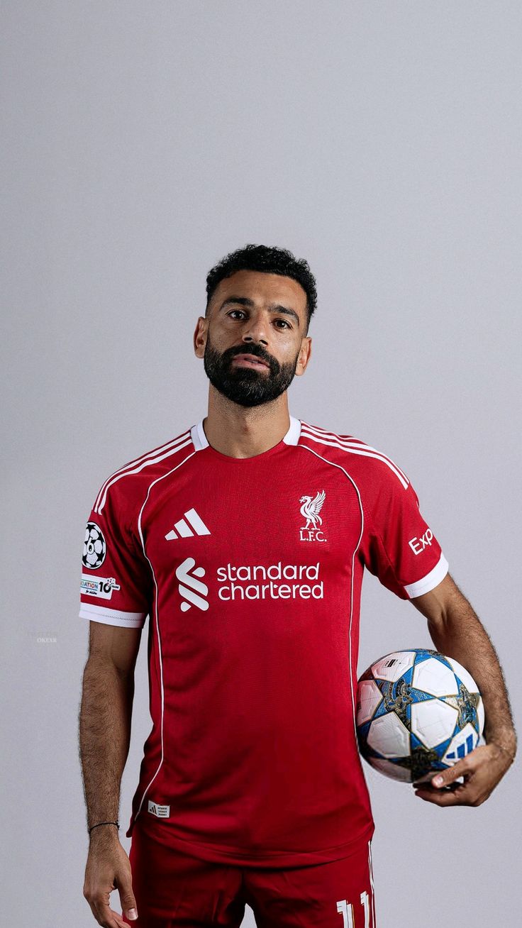 RED Liverpool 25/26 Home jersey.  Maximum Aura Only.Why It’s a Literal Flex:  A deep, rich red that screams authority. It’s the "Home Kit" energy that actually hits different with baggy denim.